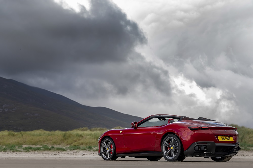Ferrari Roma Spider roof down rear angle