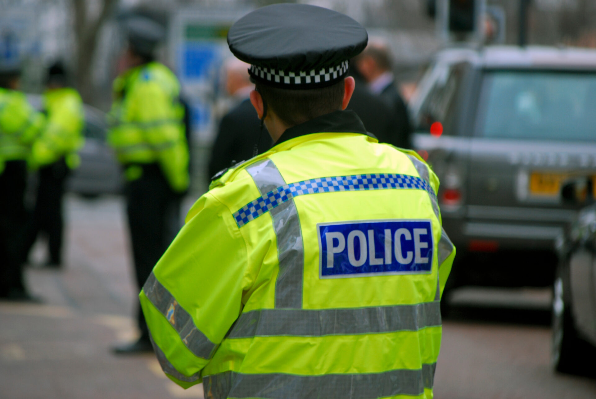 Police officers in Leeds city street during VIP visit