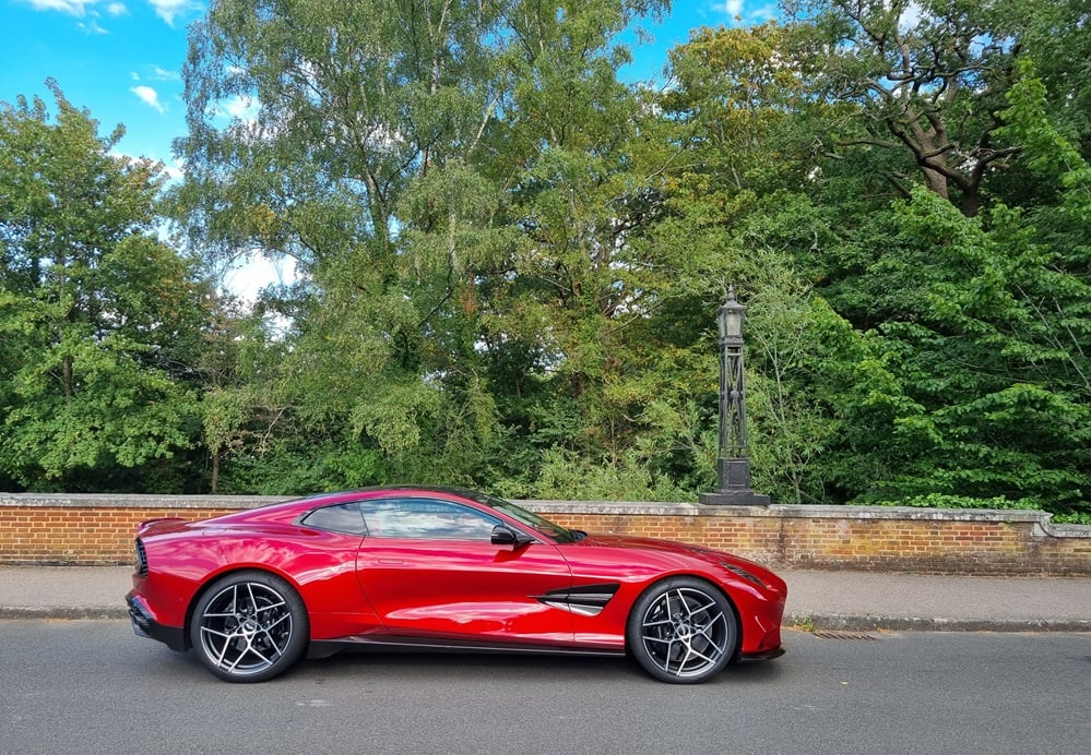 Side profile of the Aston Martin Vanquish in supernova red