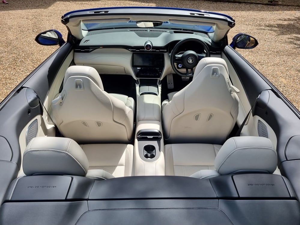 Overhead image with the roof down of the interior of the Maserati GranCabrio Trofeo