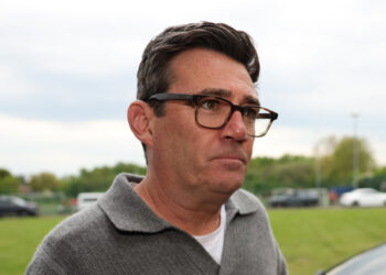 MOSTON, ENGLAND - MAY 8: Mayor of Greater Manchester, Andy Burnham arrives at FC United for a charity football match at Broadhurst Park on May 8, 2026 in Moston, England. Andy Burnham is seen by some in the Labour Party as a possible successor to leader Keir Starmer.  (Photo by Ryan Jenkinson/Getty Images)